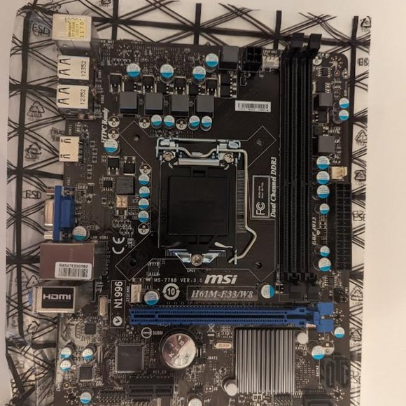 New in box MSI H61M-E33/W8 Motherboard - Picture 8 of 8